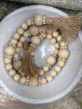 48" Wood Bead Garland With Tassels