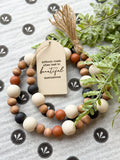 36" Wood Bead Garland With Tag