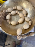 60" Mango Wood Oval Bead Garland with Tassle